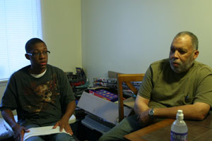 Jaleel, who was expelled from a charter school, and his father Franklin at home in Washington, D.C. (PHOTO: PAUL STEPHENS/NEWS21)
